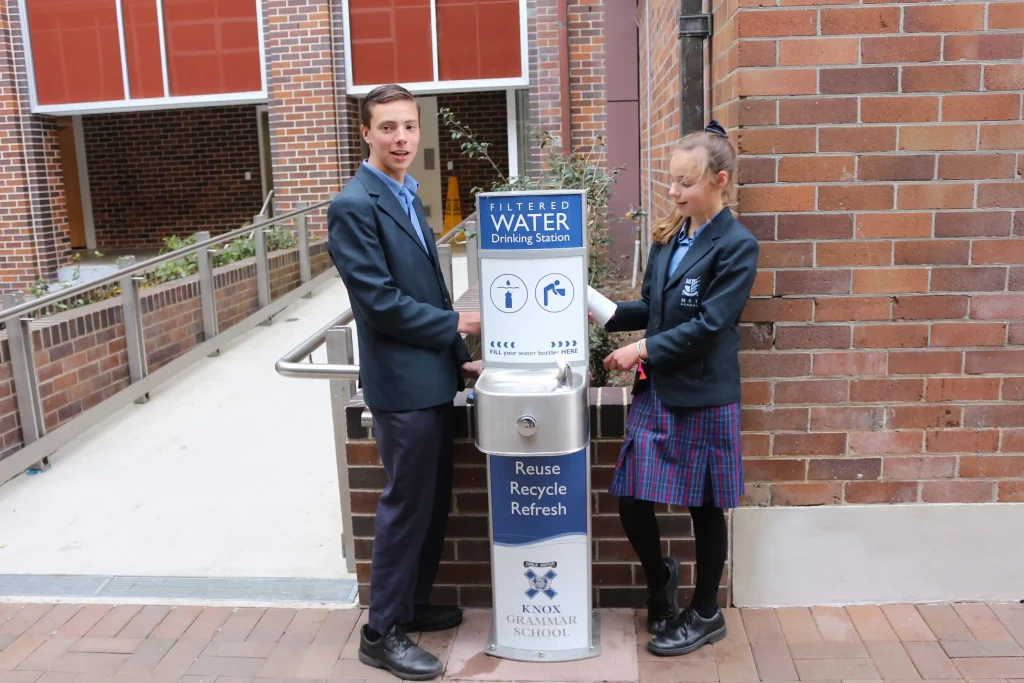 Knox Grammar School Students utilising Aquafil Pulse Bubbler Drinking Fountain and Water Bottle Refilling Station from Civiq
