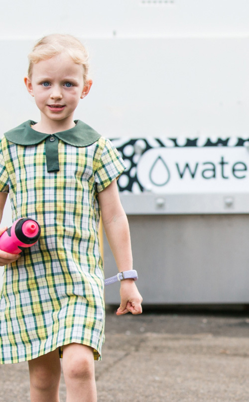 Student from Cronulla Public School carrying reusable drinking water bottle around Aquafil Hydrobank