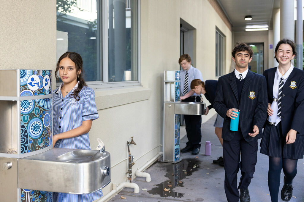Students utilising Aquafil Drinking Water Stations installed on their school grounds