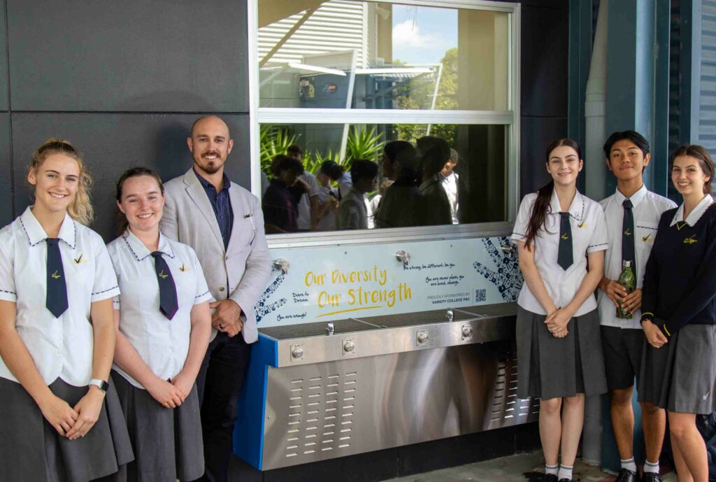 Staff and Students Posting on their new drinking water station, the Aquafil Hydrobank