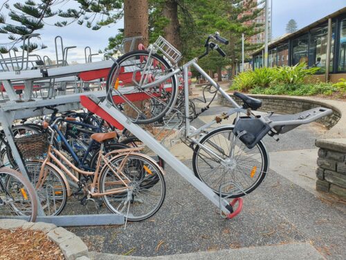 Cycla Velopa Easylift Premium Two–Tier Bike Rack installed in a public space