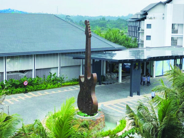 Huge gold guitar statue placed on the entrance of Hard Rock Hotel in Desaru Coast Malaysia