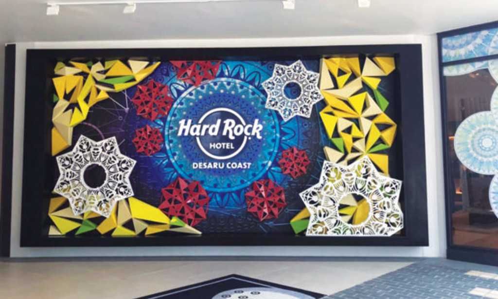 An art design with a Hard Rock Hotel Desaru Coast caption placed on the entrance of the hotel